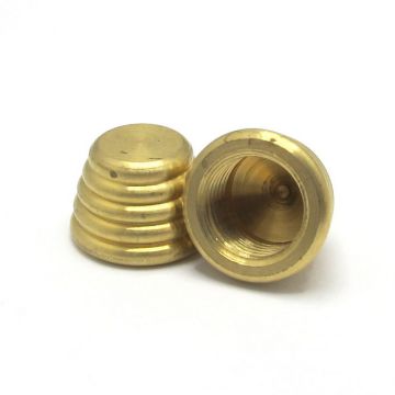 Brass finishing button