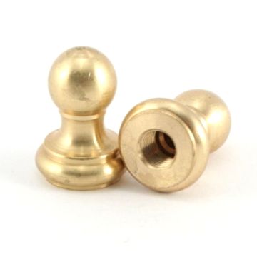 Brass finishing button